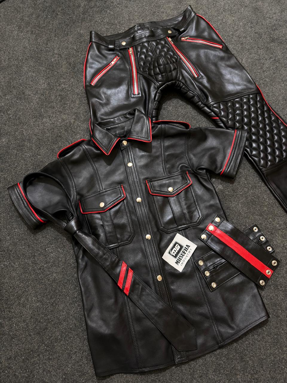 Black leather uniform shirt and quilted trousers with red piping