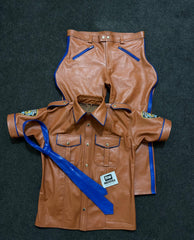 Tan leather uniform set with blue piping - shirt, trousers and tie laid flat