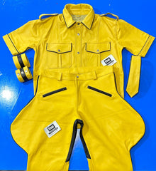 Yellow leather uniform set with black piping - shirt, trousers, tie and cuffs laid flat