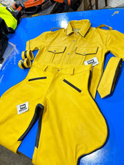 Yellow leather uniform shirt and trousers with black piped seams and zip pockets